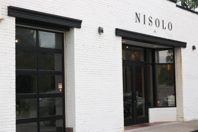Exterior view of Nisolo, a leather goods boutique in the Buchanan Arts District of Nashville, Tennessee 