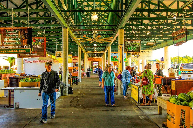 People walking by the Germantown Farmers Market