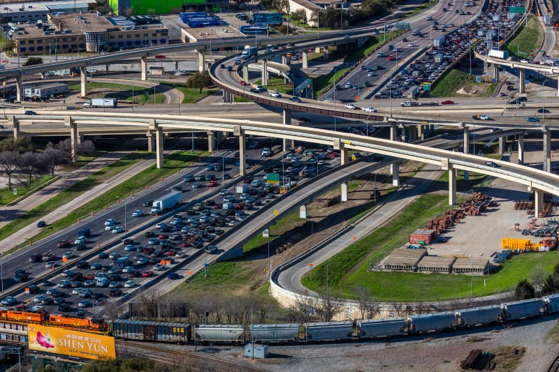 Heavy traffic passing through downtown Dallas. 