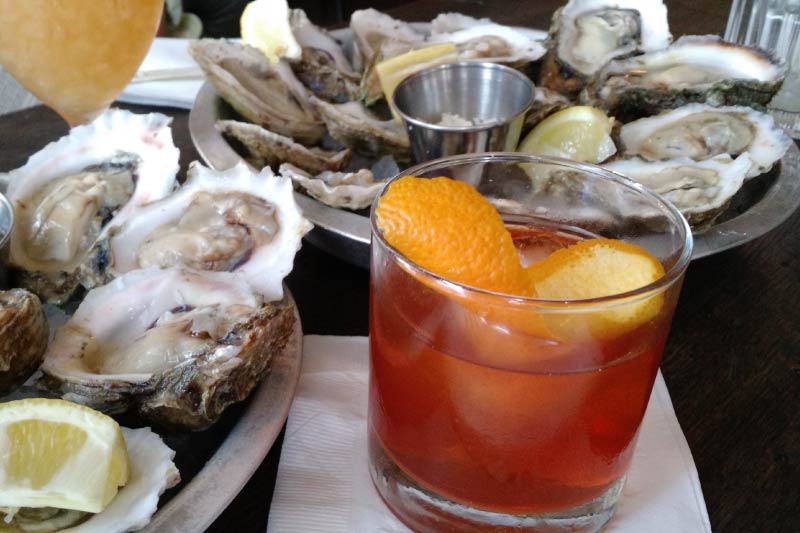 Oysters and a cocktal from Julep