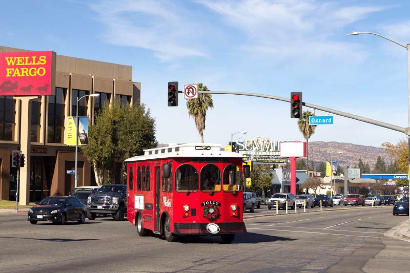 A trolley turns onto Oxnard St. in Woodland HIlls. 