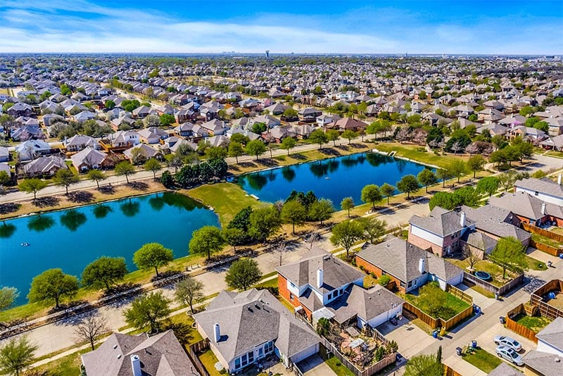 An aerial view of homes and ponds in Allen Texas