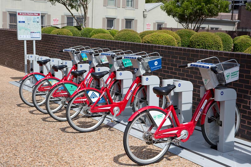 Red bikes at a B-cycle station kiosk in Austin, Texas