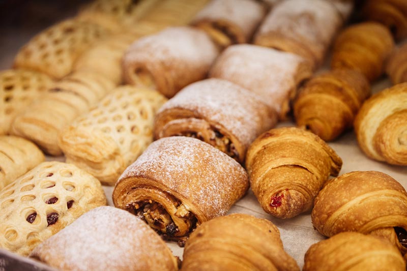 A tray of sweet baked goods taken out of the oven