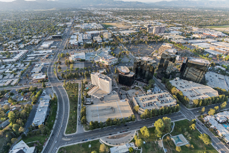 aerial image of downtown buildings and parks in canoga park