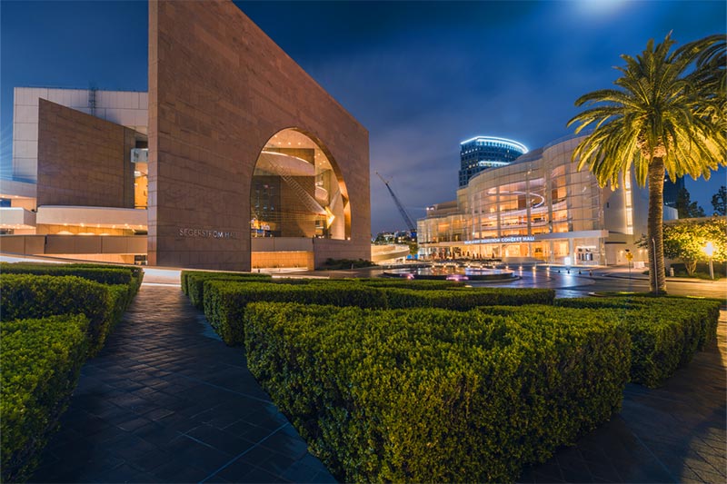 Exterior view of The Segerstrom Center for the Arts at night in Costa Mesa, California