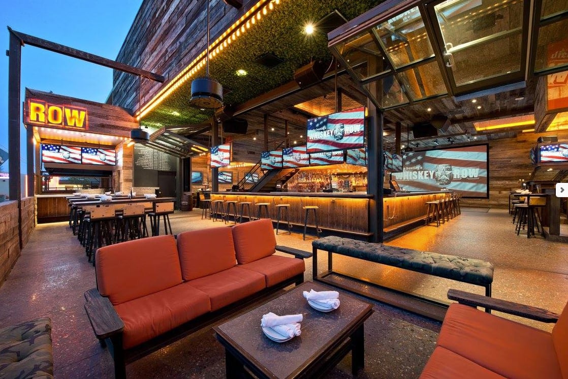 Outdoor patio and bar at Dierks Bentley’s Whiskey Row in Gilbert, AZ