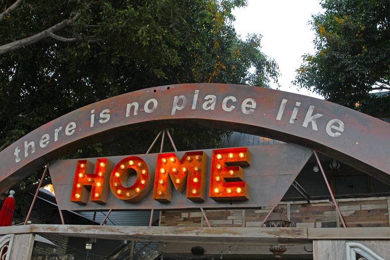 Sign in Los Angeles neighborhood that says There is no Place Like Home.