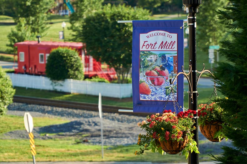 Welcome flags on main street in historic downtown Fort Mill, South Carolina