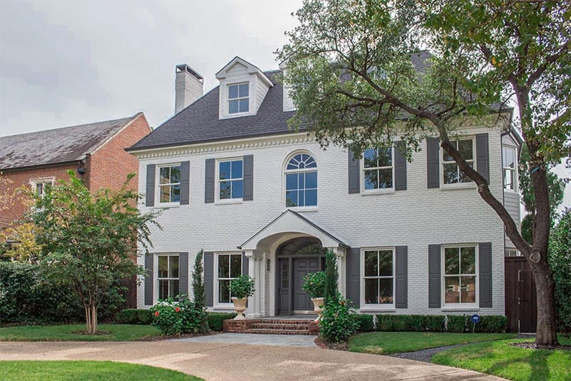 A large home on a residential block of Highland Park in Dallas Texas