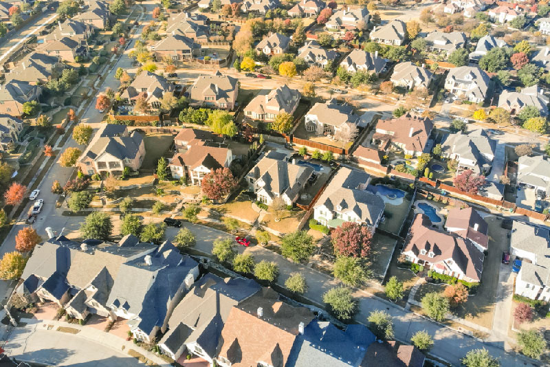 aerial shot on rows of homes in a neighborhood