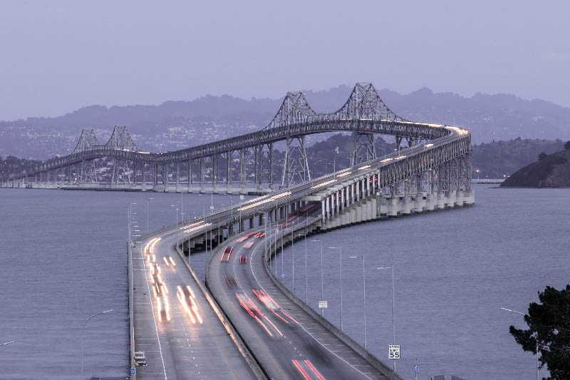 Aerial view of cars driving along The San Rafael Bridge in San Rafael, California