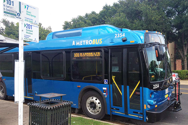 A CapMetro bus at a bus stop in Austin, Texas