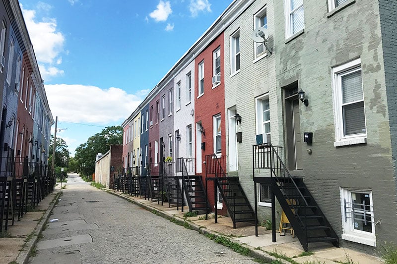 A street lined with rowhouses in Baltimore, Maryland