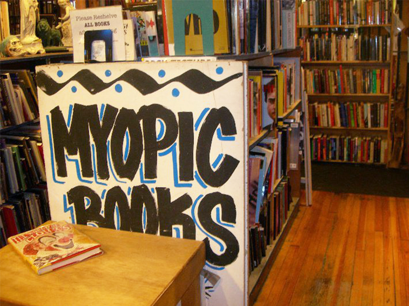 Sign for Myopic Books on the side of a bookshelf in Chicago's Wicker Park neighborhood