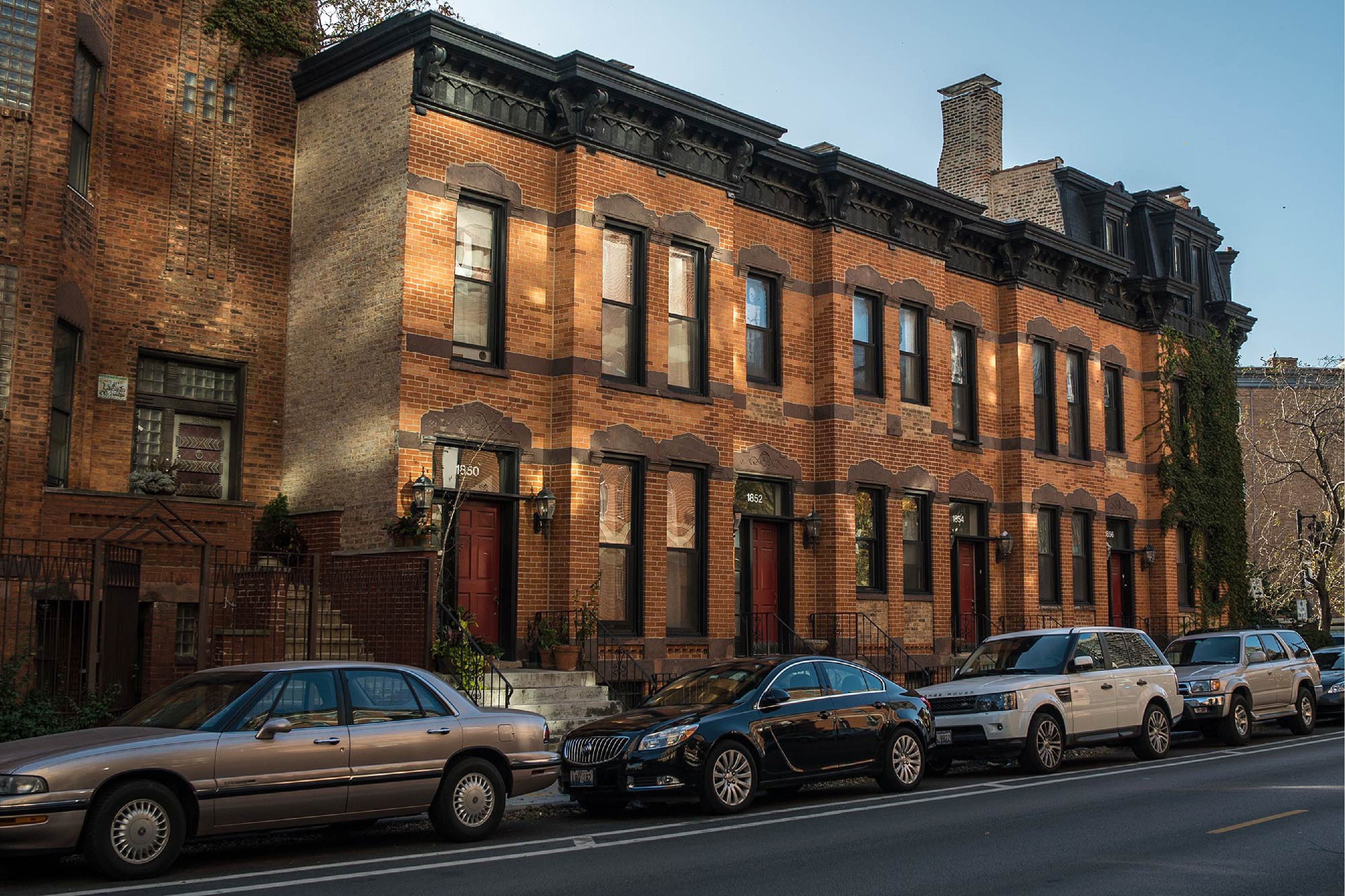 Cars parked in front of Lincoln Park homes