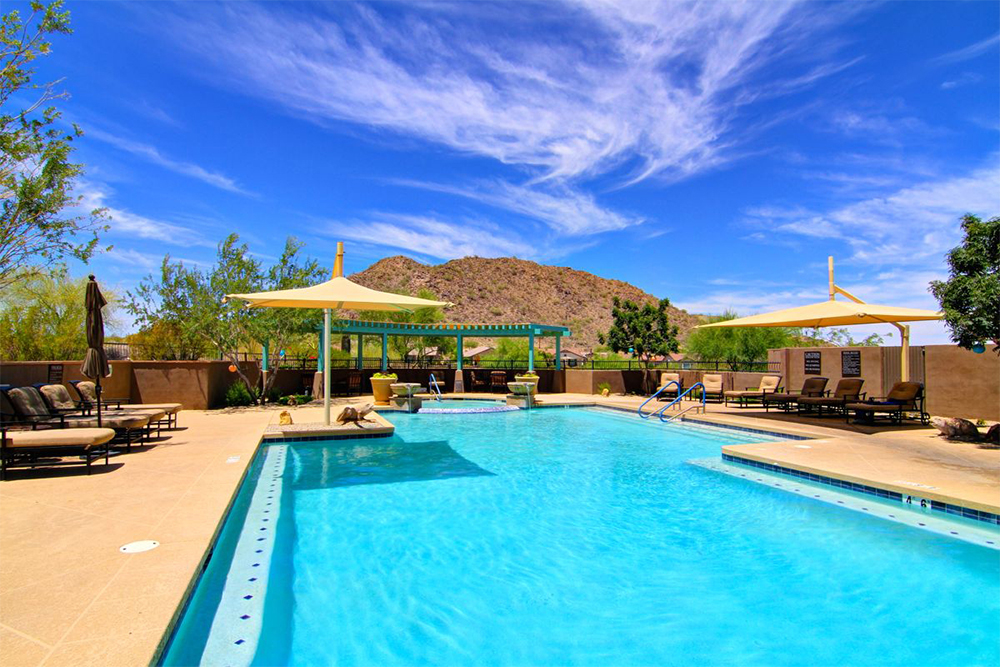 An outdoor pool & patio at the master-planned community Johnson Ranch in San Tan Valley, AZ.