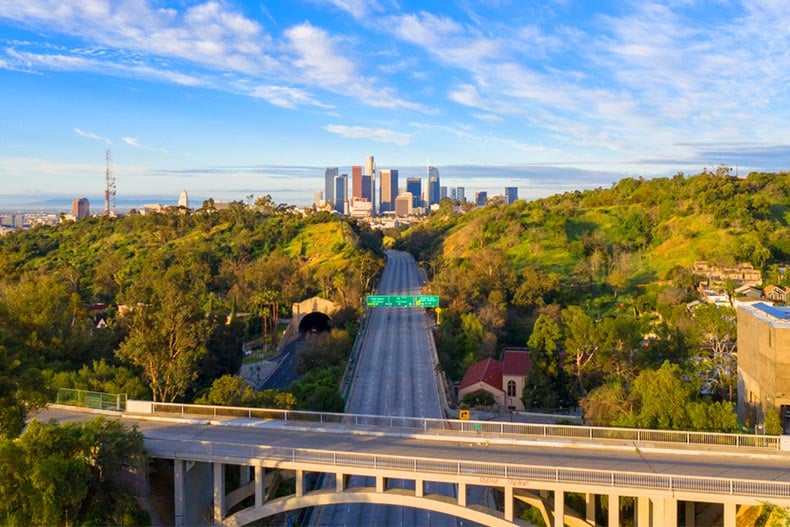 Aerial view of empty freeway streets with no people in downtown Los Angeles, California as result of coronavirus pandemic