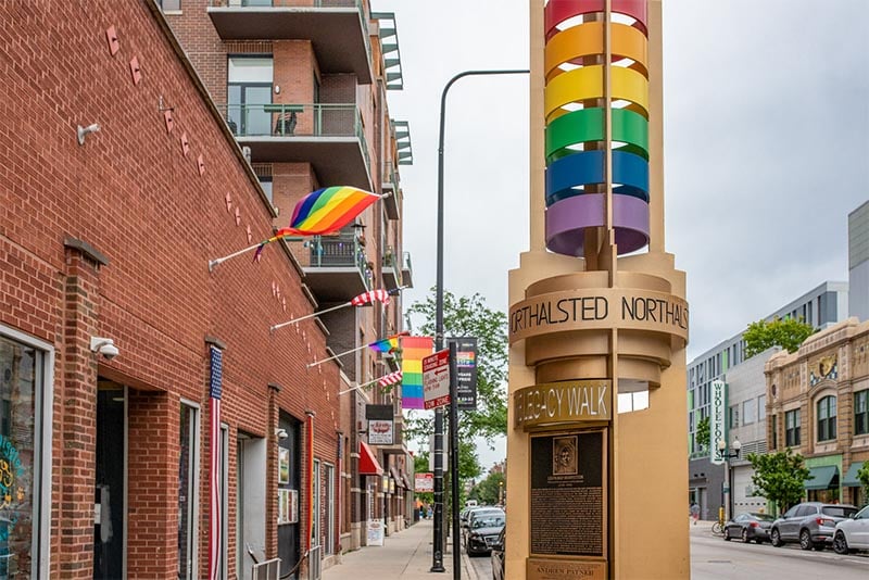 Rainbow flags and streetlights in the Boystown neighborhood in Chicago