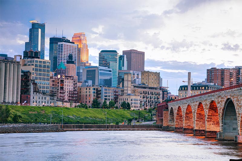 A view of the Minneapolis skyline as seen from a bridge entering the downtown area