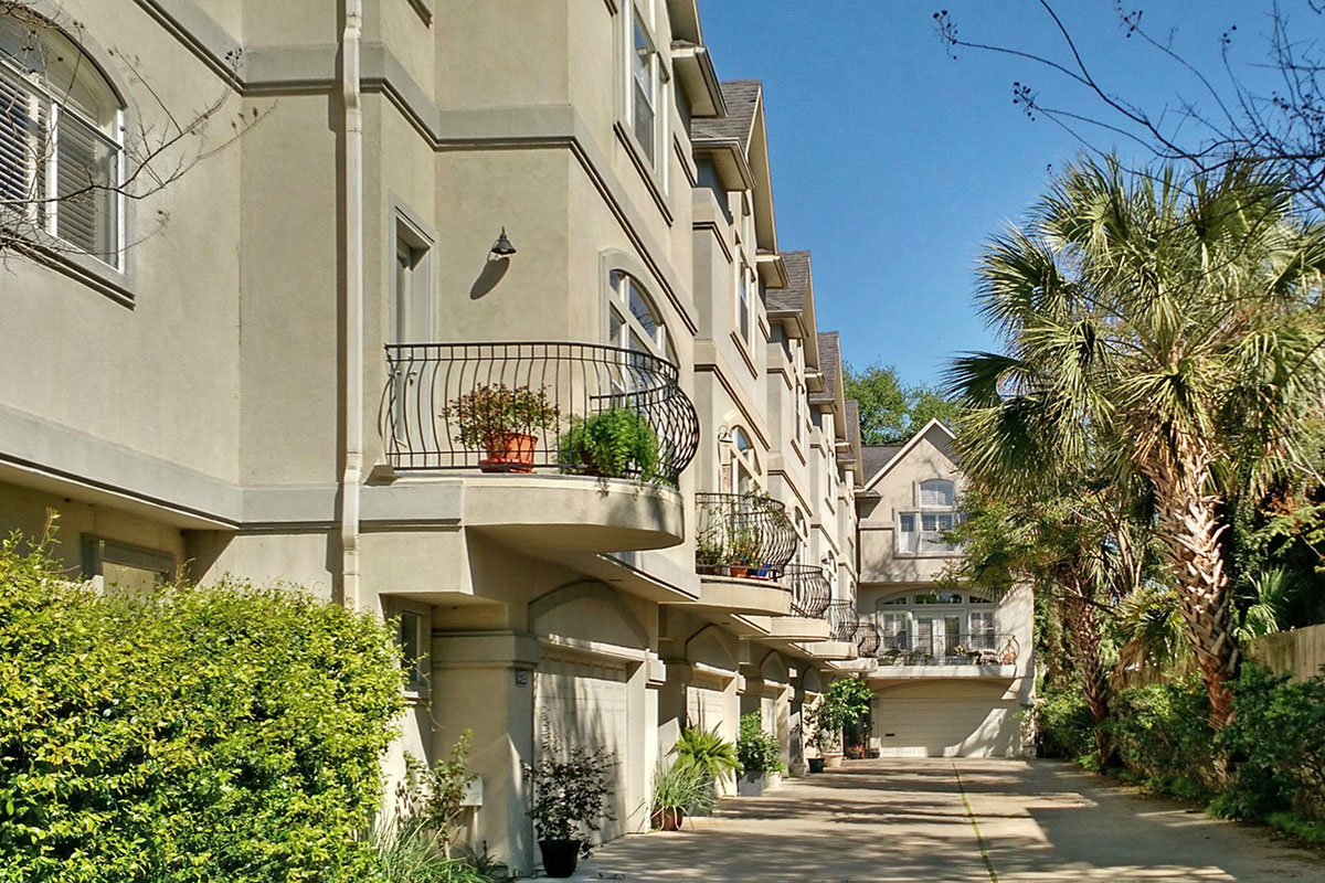 Condos with a balcony and garage  