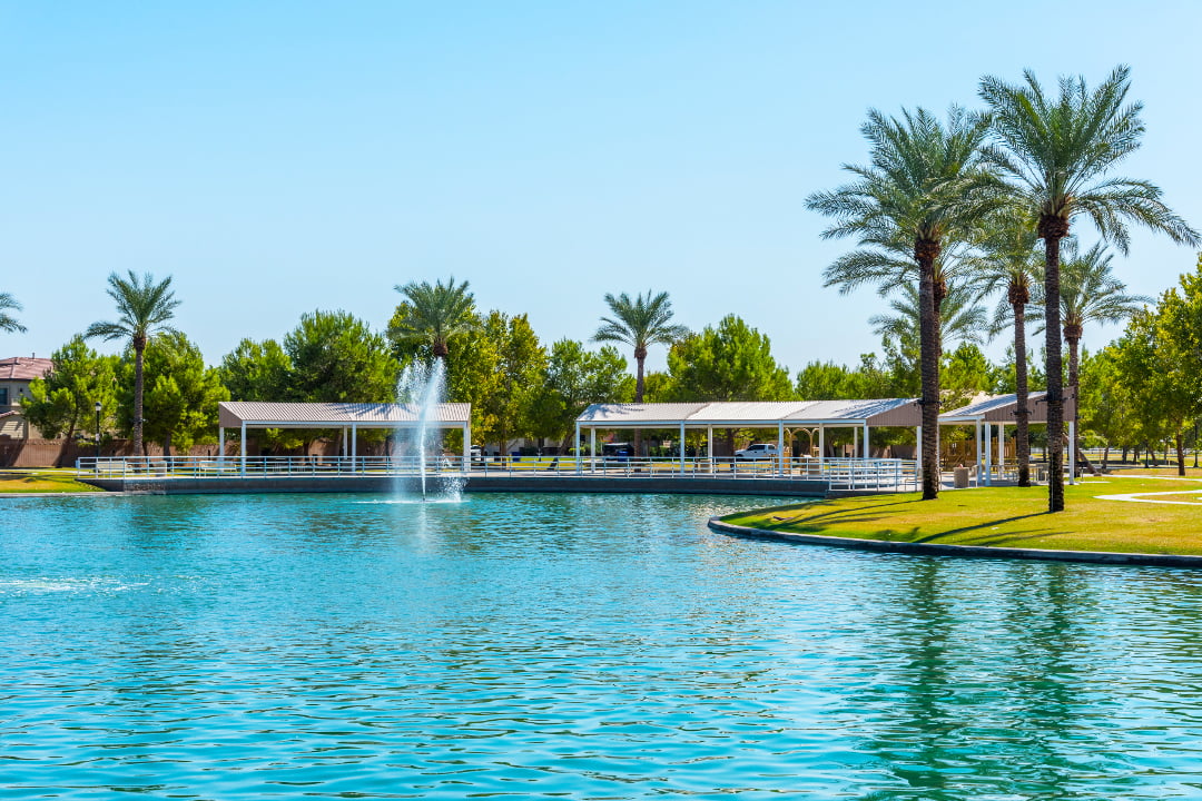 A scenic lake and fountain at the master-planned community of Morrison Ranch in Gilbert, AZ