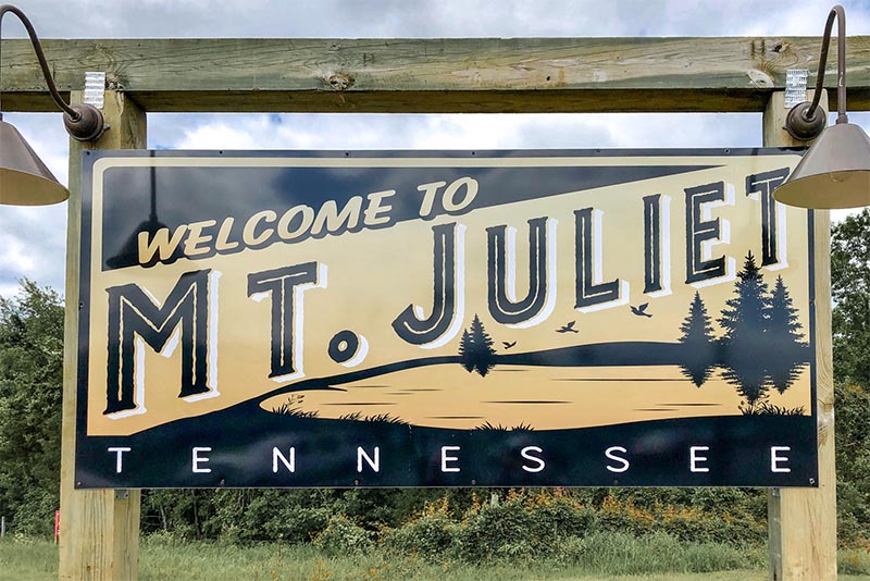 A wood sign that says Mt Juliet Tennessee