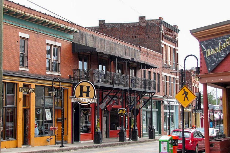 A row of brick building businesses in Old City Knoxville