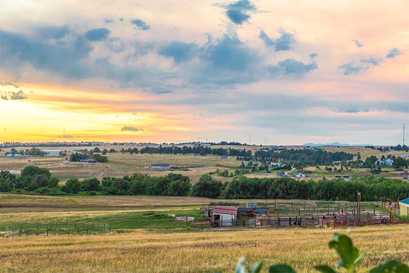 A rural small town outside Denver with the view of rolling plains