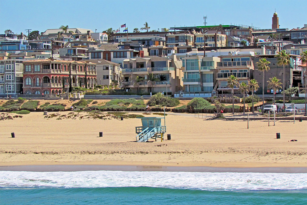 Houses on the beach in sand section 