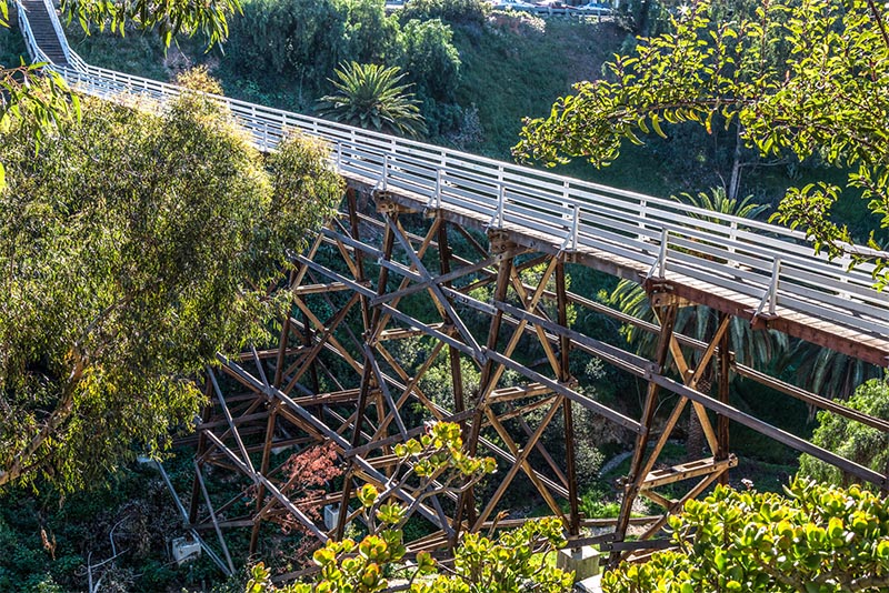 The historic Quince Bridge rising above a deep valley in San Diego