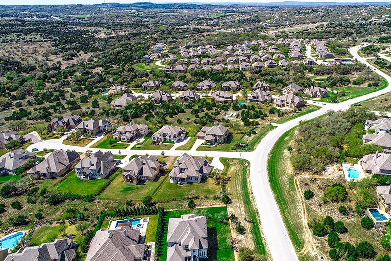 An aerial view of a subdivision in Dripping Springs, Texas