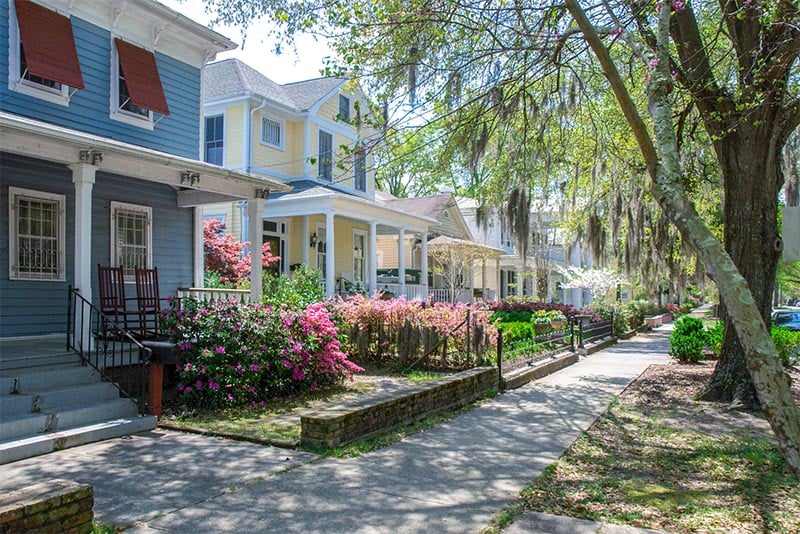 Historic homes along a tree-lined street in Wilmington, North Carolina