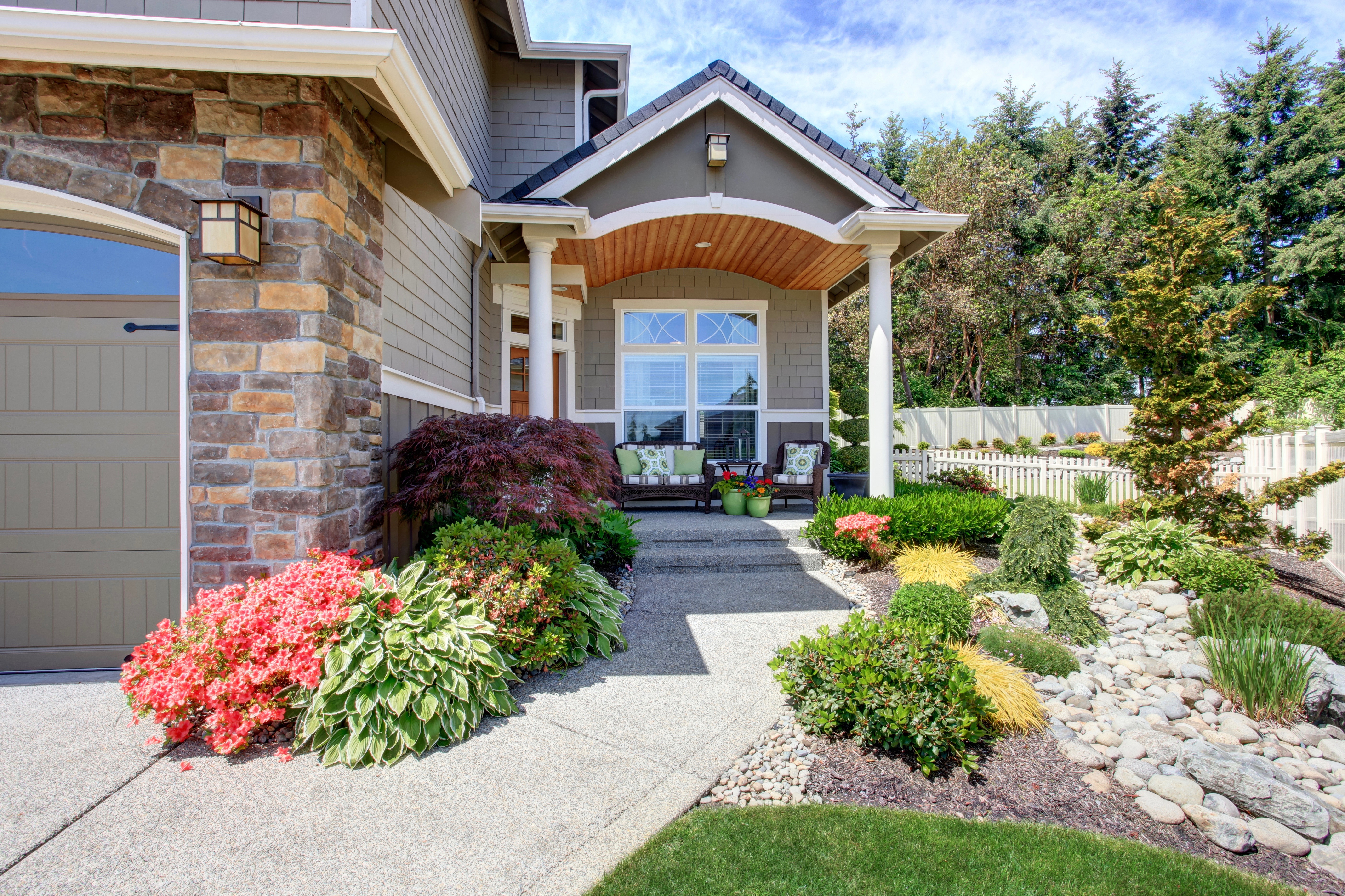 Beautiful home with luscious garden and curb appeal.