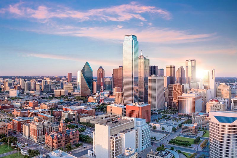 An aerial view of tall buildings in the Downtown Houston area