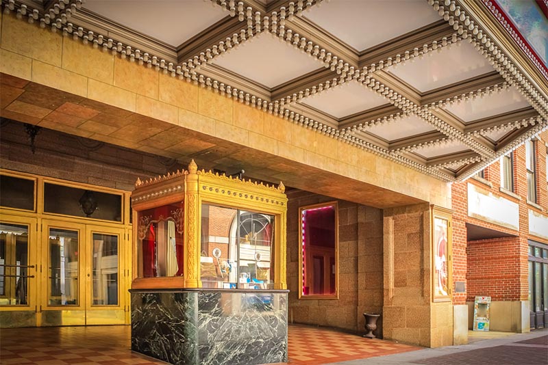 The gilded box office of the Tennessee Theater under the awning in Knoxville