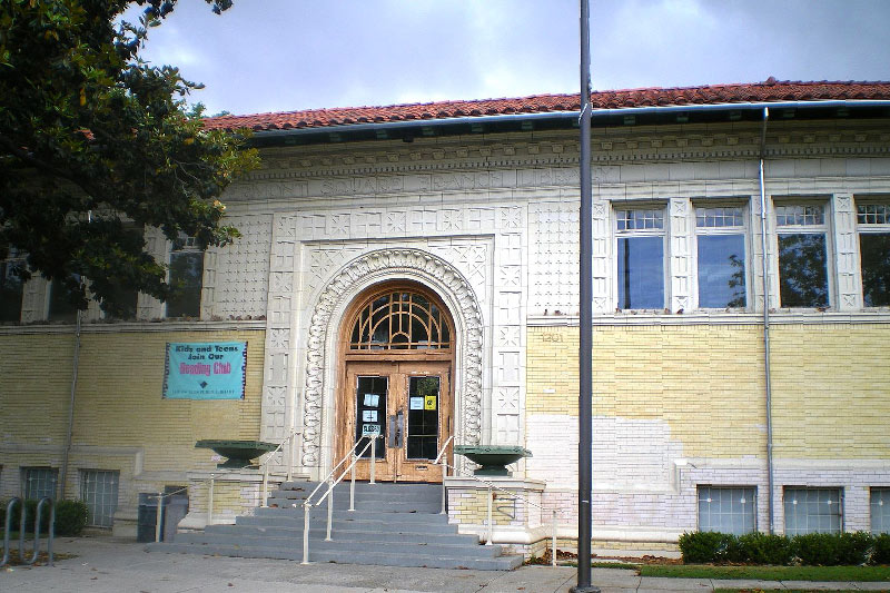 exterior of library building with sign